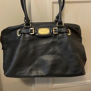 Like new Michael Kors black bag. Used once. Soft leather.